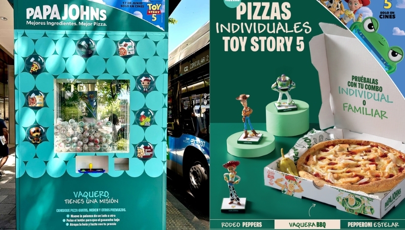 Marquesina de Papa Johns inspirada en la máquina de gancho de Toy Story 5 y promoción de pizzas de la marca.